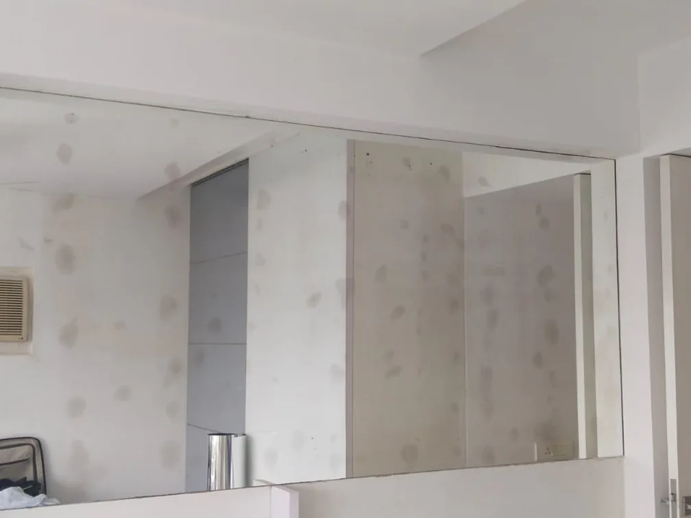 The same screen after a patterned privacy film, the cabin no longer readable through it