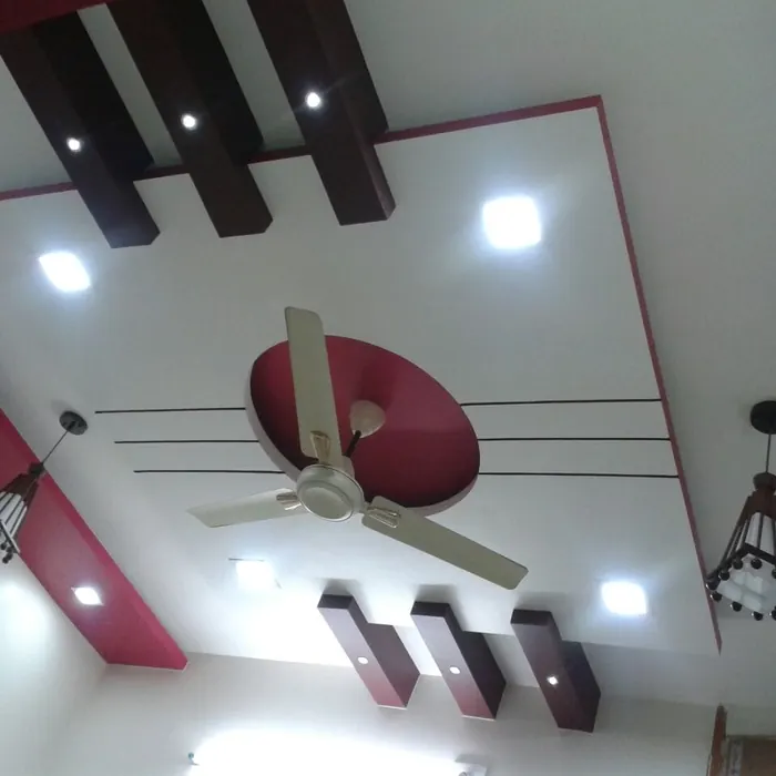 Shaped POP ceiling with concealed lighting and a fan