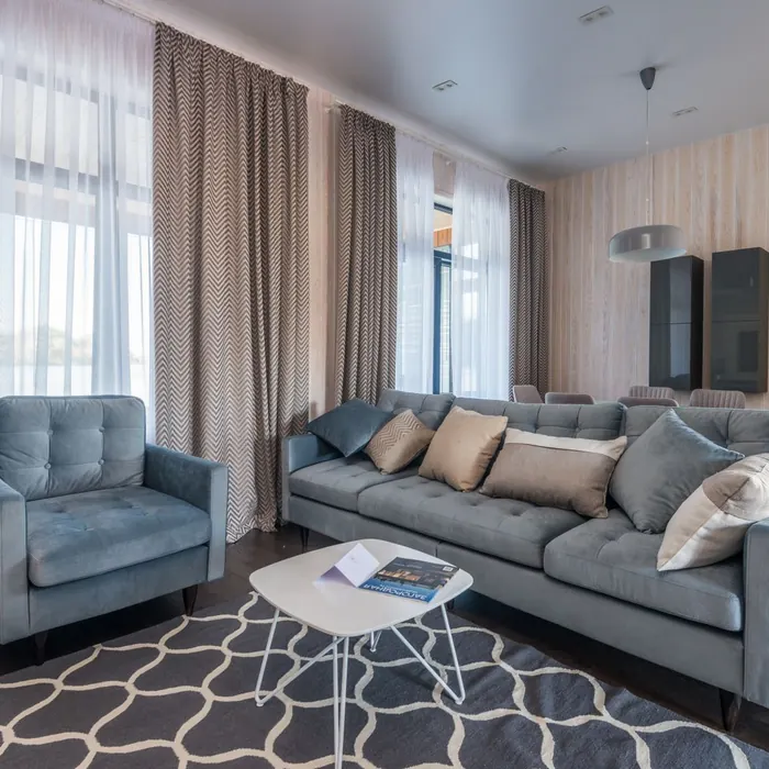 Full-length curtains framing a living room window