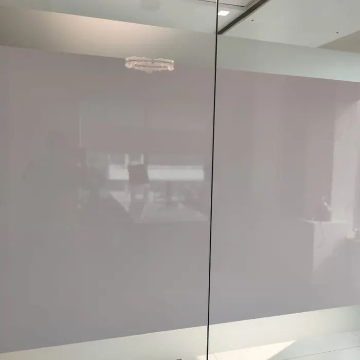 Plain white frosted film across a wide glass panel