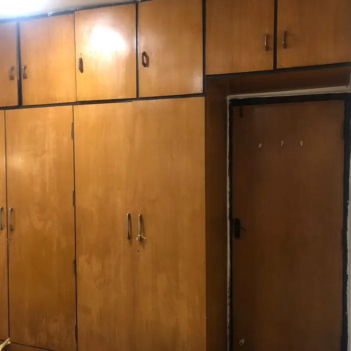 Original timber wardrobe before relamination