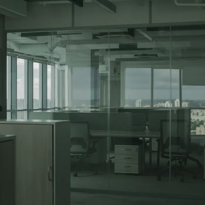 Glass-walled offices overlooking the city