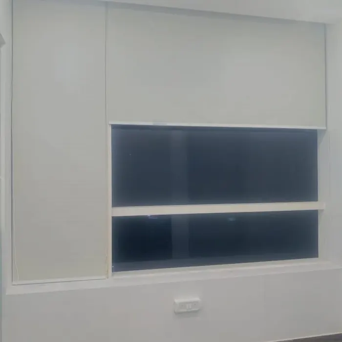Office wall panelled around a recessed display niche