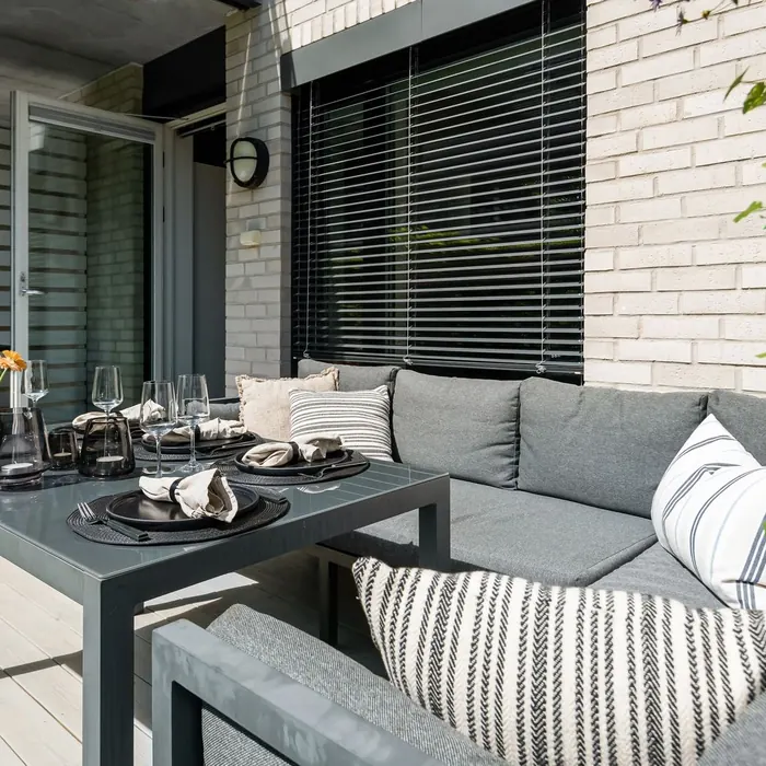 Covered patio screened by exterior blinds