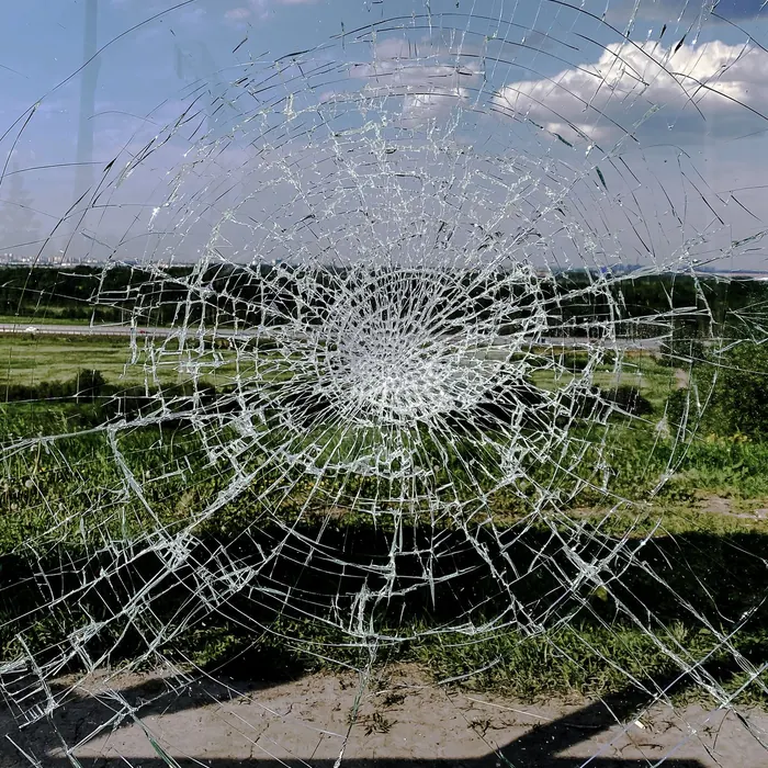 Cracked glass panel still holding its shape