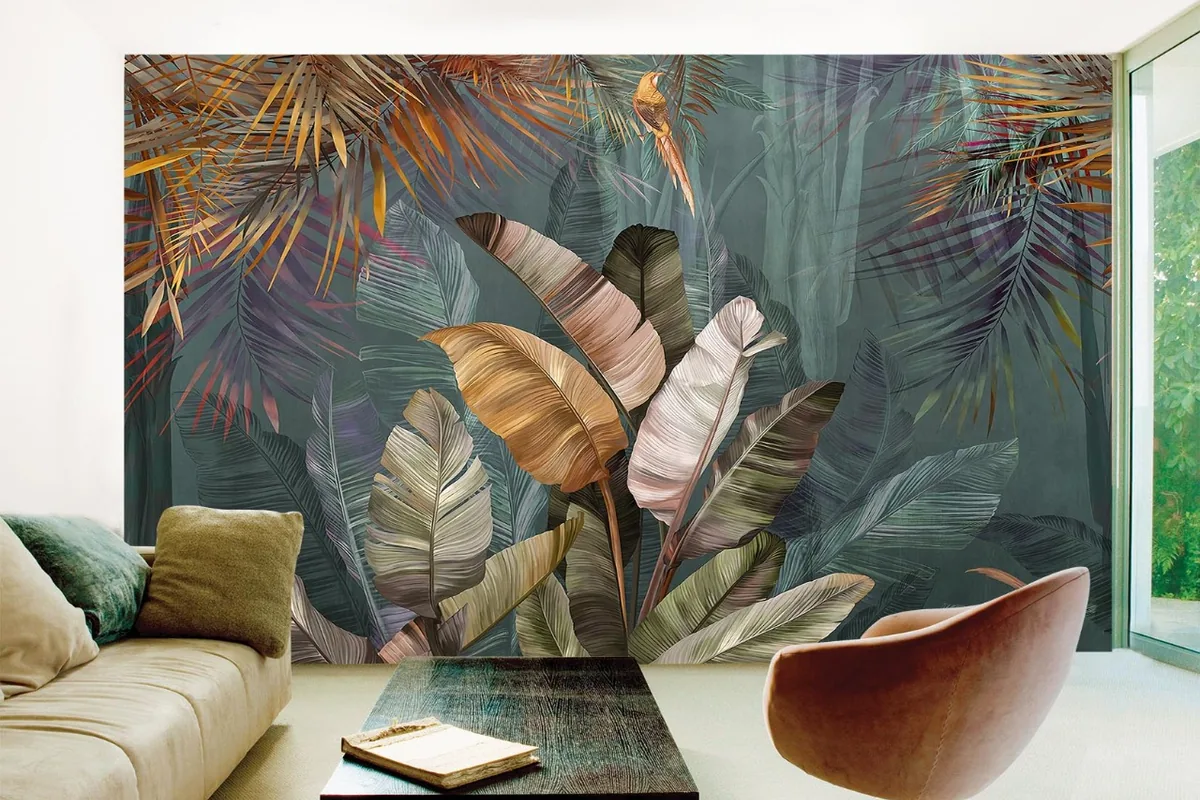 Living room feature wall covered in a large tropical leaf mural