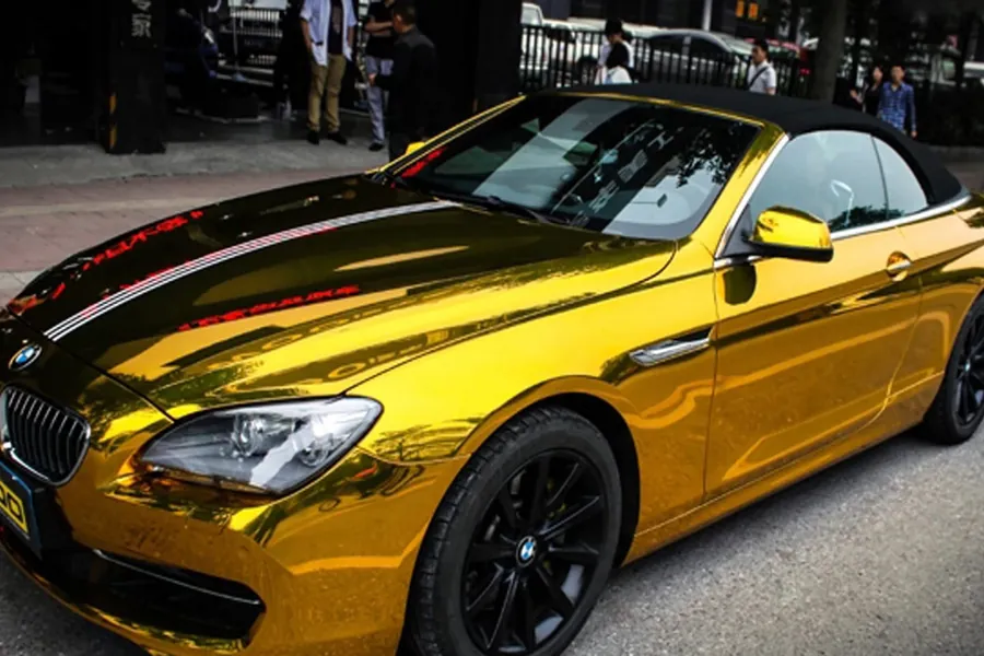 Convertible finished in a gold chrome vinyl wrap