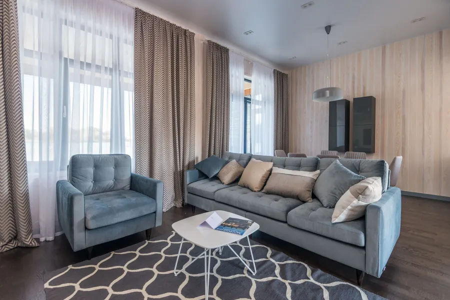Full-length curtains framing a living room window