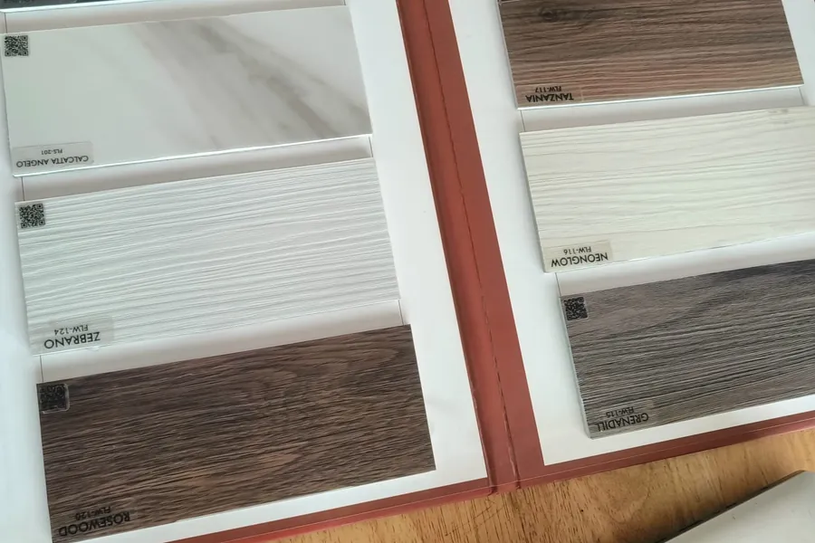 Flooring finishes displayed on a sample board